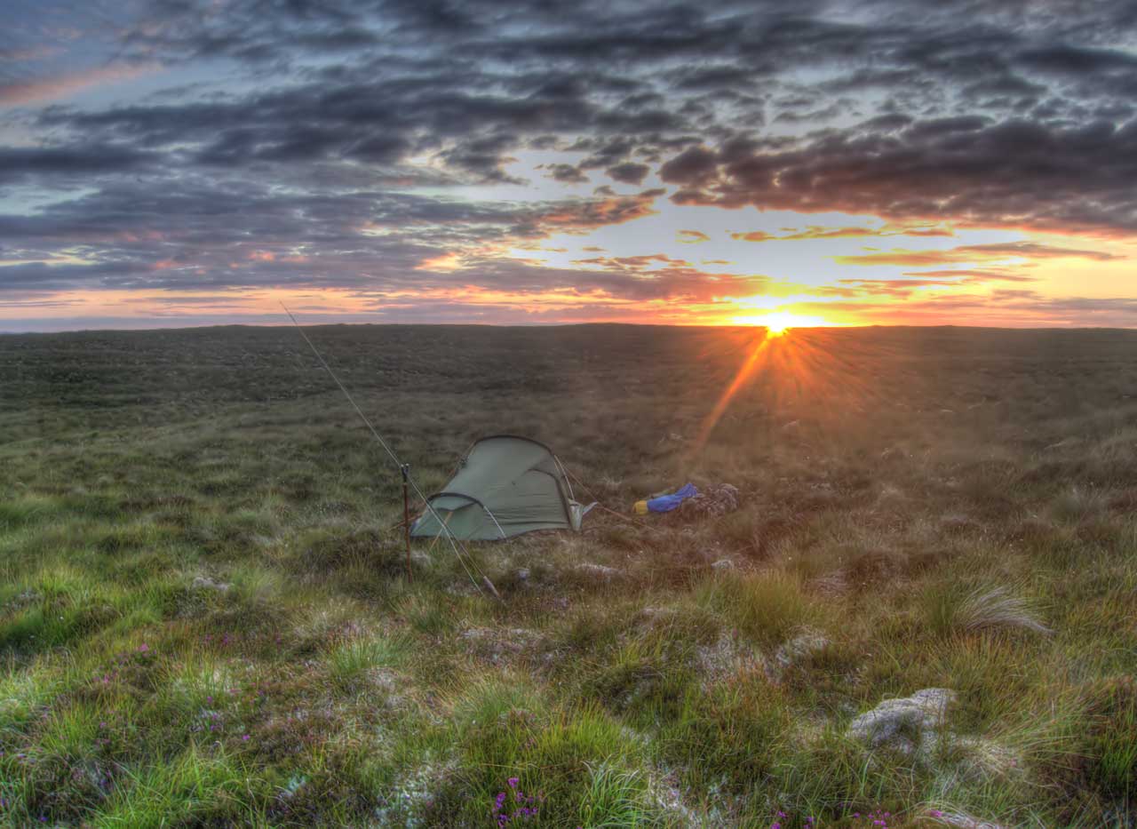 Sunset while camping on remote Lewis moorland